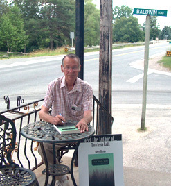 Gerry Burnie, winner of the iUniverse Editor's Choice, Publisher's Choice, and Readeer's Choice awards, for his novel "Two Irish Lads." Seen here at a book signing at Baldwin, Ontario.